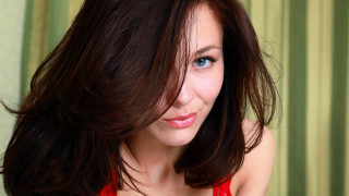 Woman red dress smiling green 2 - headshot free wallpaper for desktop