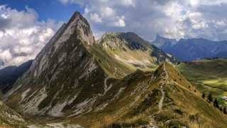 Mountain range clouds trees panorama - the ground below free wallpaper