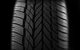 Tire closeup black background white 2 - free motorcycles wallpaper for desktop