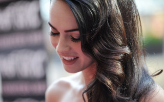 Woman longhair smiling ponytail cellphone - a ponytail free wallpaper