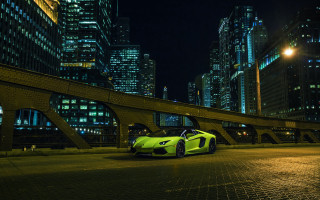 Yellow sports car city night - a yellow sports car free wallpaper