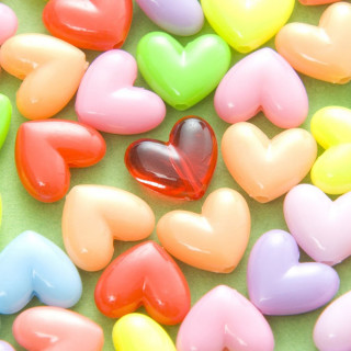 Heart shaped candies green surface - free hearts wallpaper for tablet
