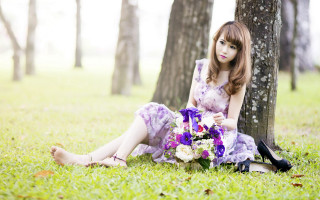 Woman sitting in grass bouquet - a bouquet of flowers free wallpaper for desktop