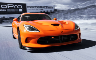 Sports car road sky sign - a sports car free wallpaper