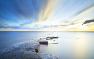 Sunset water rocks blue sky - rock free wallpaper