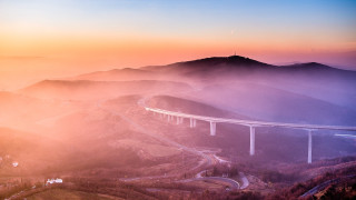 Highway valley bridge sunset fog - a valley free wallpaper