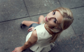 Woman sitting crossed legs upward - looking free wallpaper