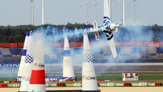 Futuristic plane over cones cityscape - cubofuturism free wallpaper