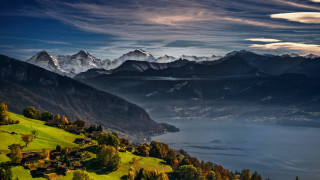 Mountain lake forest sunset sky 6 - a scenic view of a mountain range free wallpaper