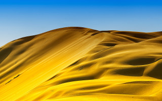 Yellow sand dune blue sky - photography free wallpaper