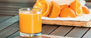 Orange juice glass wooden table 2 - cutting free wallpaper