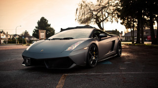 Grey sports car parking lot 3 - a grey sports car free wallpaper