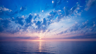 Sunset ocean clouds horizon beach - a beautiful sunset over the ocean free wallpaper