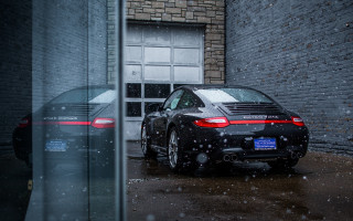 Snow parked car building reflections - a parking lot next free wallpaper