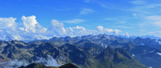 Mountain range clouds plane nature - a view of a mountain range free wallpaper for desktop