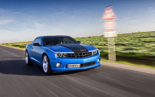 Blue car driving road green 4 - a blue car free wallpaper