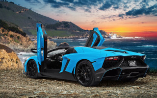Blue sports car rocky beach - the door free wallpaper