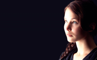 Woman braids portrait realistic dark - a black background behind her free wallpaper for desktop