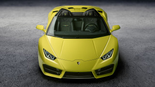 Yellow sports car top open - a dark surface free wallpaper