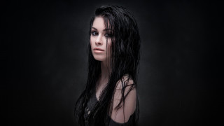 Gothic portrait blackhair blackdress browneyes - a black background free wallpaper for desktop
