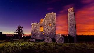 Stone tower night redsky cityscape - romanesque free wallpaper for desktop