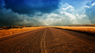 Dirt road grass field clouds - a dirt road free wallpaper