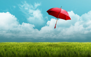 Red umbrella flying field clouds - a red umbrella free wallpaper