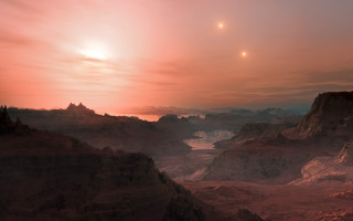 Mountains water sunset planets space - orange sky free wallpaper