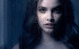 Rain drops woman window looking - the window free wallpaper