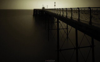 Foggy pier lighthouse horizon sunset - the horizon free wallpaper