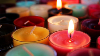 Candles group lit center naturalism - a group of candles free wallpaper