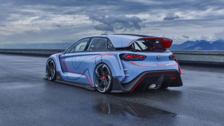 Blue car red stripes mountains - a wet road free wallpaper