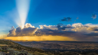 Mountain light crest sunset clouds - a view of a mountain free wallpaper