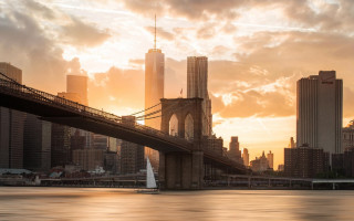 Sailboat bridge city sunset water - the water near a city skyline free wallpaper for desktop