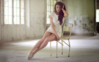 Woman sitting room window tilt - a chair in a room free wallpaper