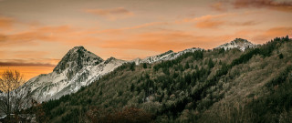 Mountain forest sunset horizon lake - a red sky in the background free wallpaper
