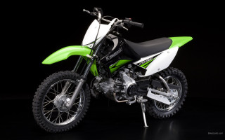 Green white dirtbike black ground - a computer rendering free wallpaper