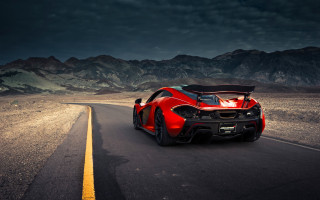 Red sports car mountains night - a dark sky free wallpaper