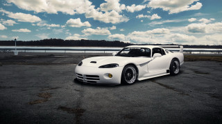 White sports car lake clouds - a parking lot next free wallpaper