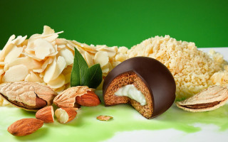 Chocolate candy almonds green background - candy free wallpaper