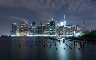 City skyline night water docks - a body of water in front free wallpaper for desktop