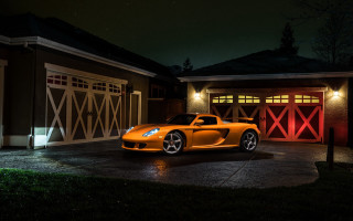 Yellow sports car night garage - a red door free wallpaper