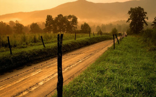 Dirt road fence field sunset 2 - a dirt road free wallpaper