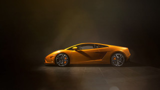 Orange sports car dark room 18 - nice looking orange sports car free wallpaper
