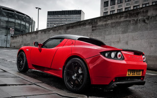 Red sports car marble sculpture - the side of a road next free wallpaper for desktop