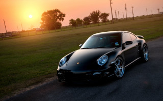 Black sports car sunset field - anthony s waters free wallpaper