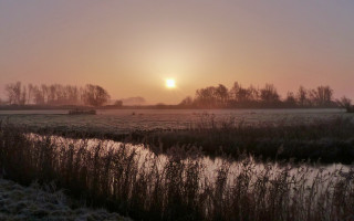 Sunset river field trees snow - a sunset over a field free wallpaper