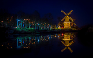Windmill river reflections night cityscape - a windmill free wallpaper for desktop
