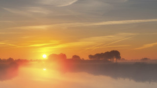Sunset lake trees clouds contrails - volumetric light free wallpaper