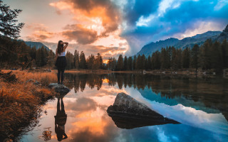 Woman lake sunset clouds rock - a rock in front free wallpaper for desktop